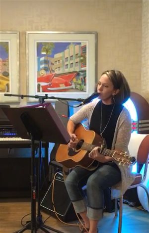 Miss Julie singing at  a Senior outreach music share 2018